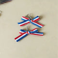 Boucles d'oreilles pendantes nœud en ruban gros-grain