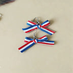 Boucles d'oreilles pendantes nœud en ruban gros-grain