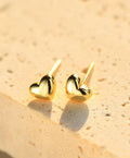 Boucles d'oreilles puces en forme de cœur dorées pour femme
