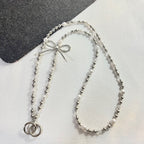 Collier élégant perles et chaîne