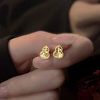 Clous d'oreilles pour femme design cœur avec accents étincelants