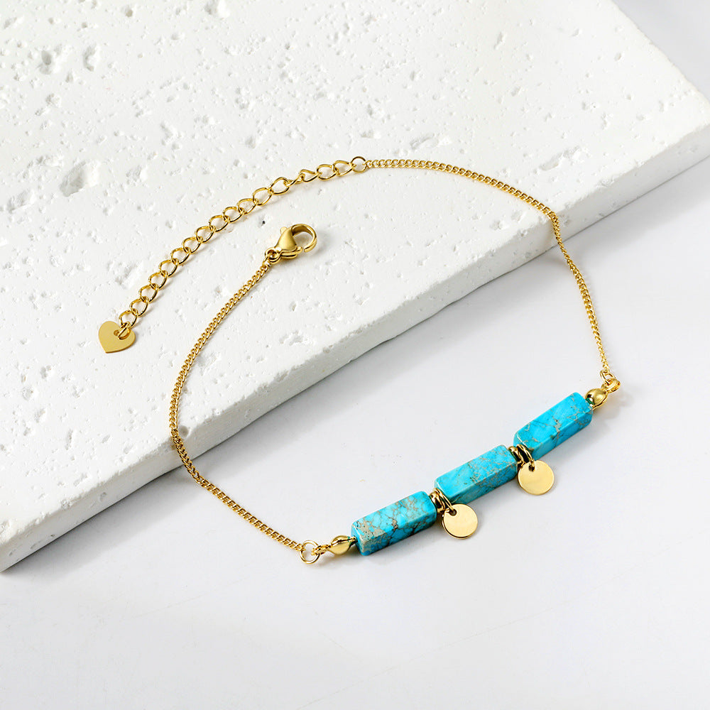 Bracelet pour femme avec éléments en pierre des Caraïbes et détails dorés