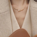 Collier pour femme avec perle et design minimaliste