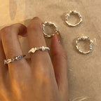 Boucles d'oreilles pour femme avec perles et design en argent