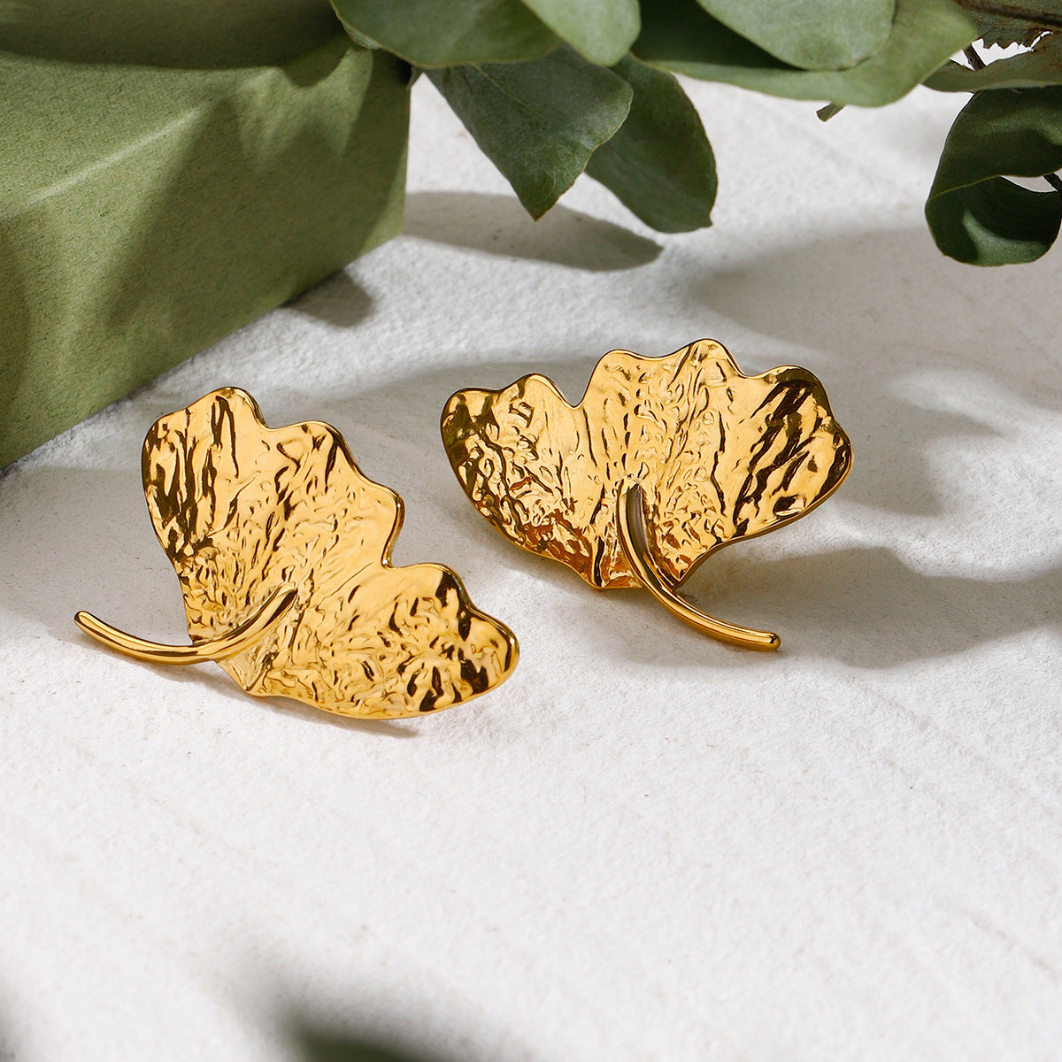Boucles d'oreilles pendantes pour femme en forme de feuille