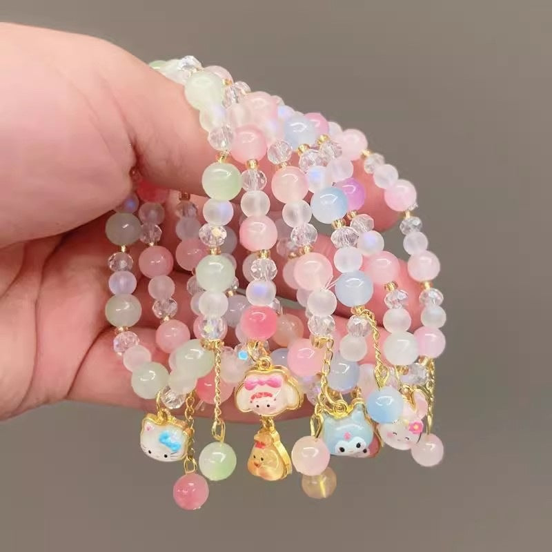 Bracelet fantaisie avec perles en verre colorées et pendentif