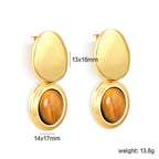 Boucles d'oreilles pendantes œil de tigre et cadre doré