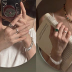 Bague pour femme au design élégant et incurvé avec pierre verte