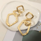 Boucles d'oreilles élégantes pour femme au design plissé rustique