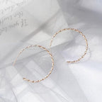 Boucles d'oreilles pour femme au design incurvé moderne
