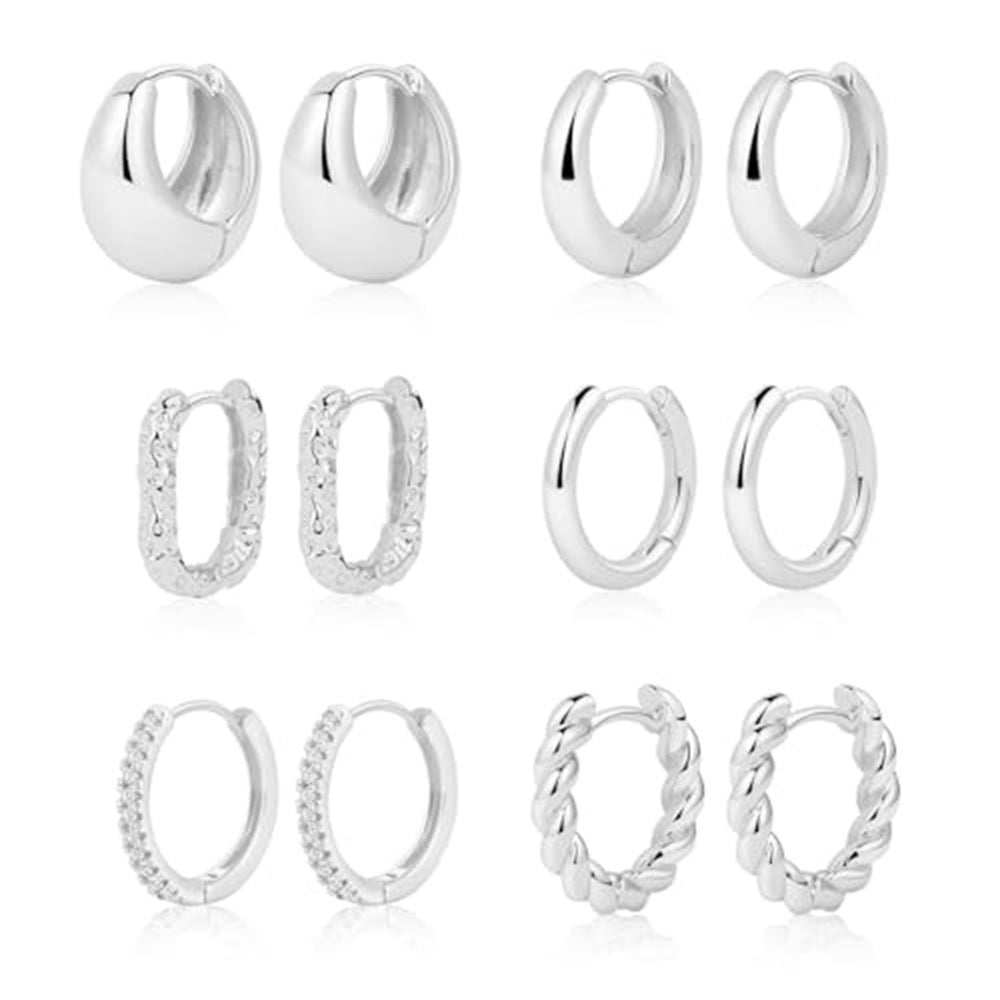 Boucles d'oreilles pendantes dorées pour femme au design goutte moderne