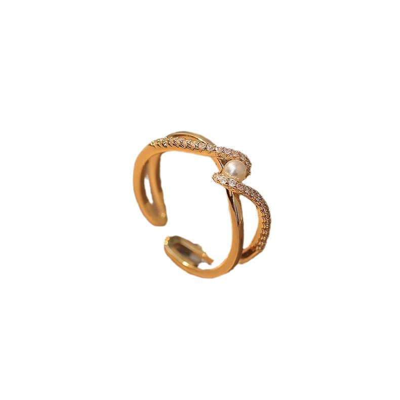 Bague spirale élégante avec perle et zircone