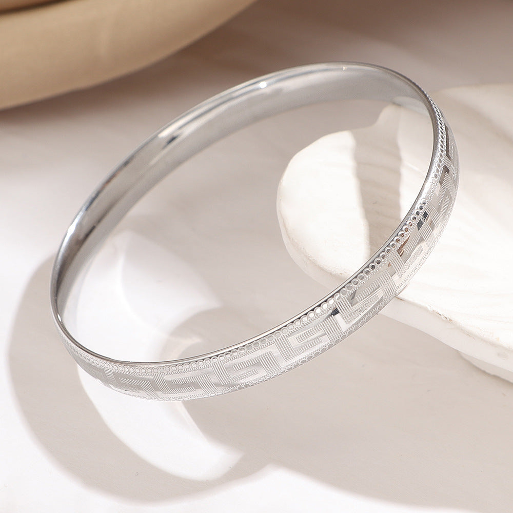 Bracelet jonc gravé doré pour femme