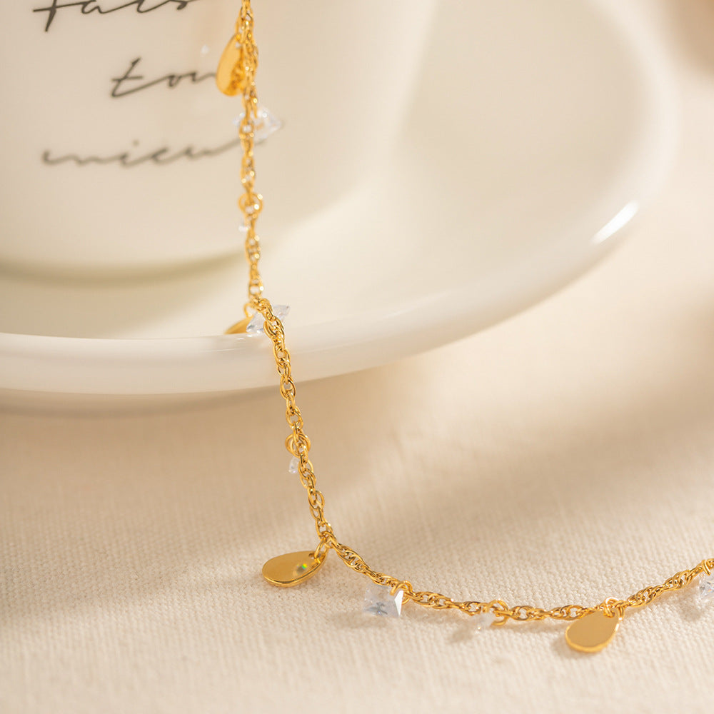 Bracelet pour femme avec cristaux étincelants et pendentifs gouttes
