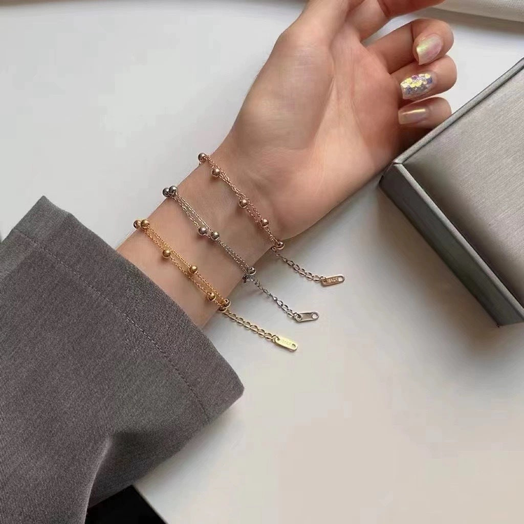 Bracelet double rang avec perles pour femme