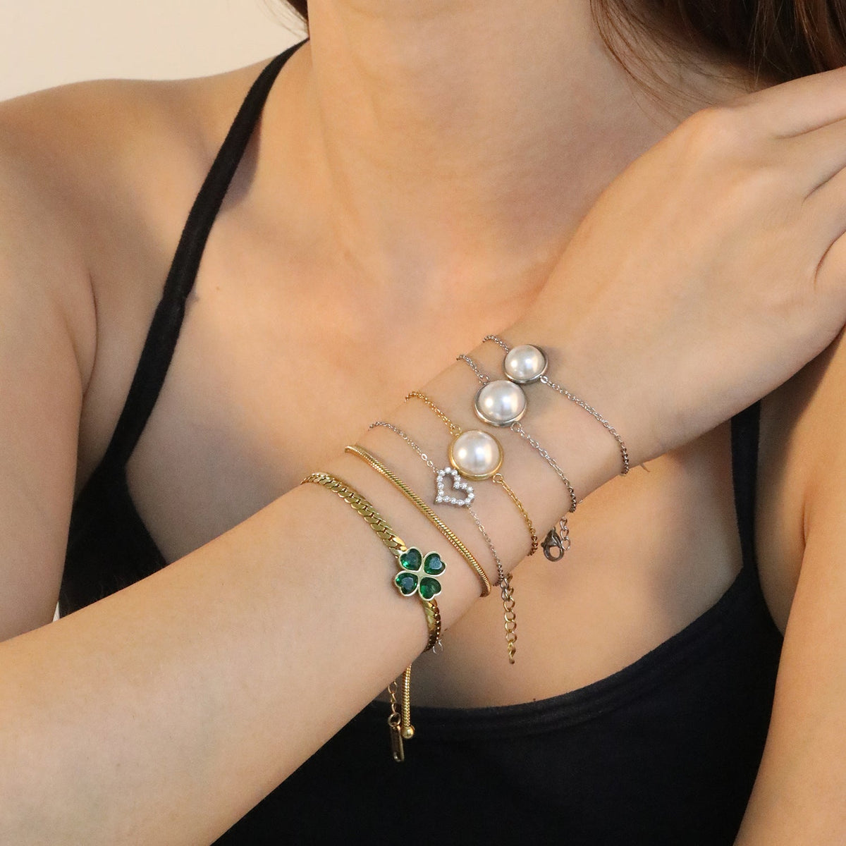 Bracelet pour femme avec perle et structure à maillons élégante