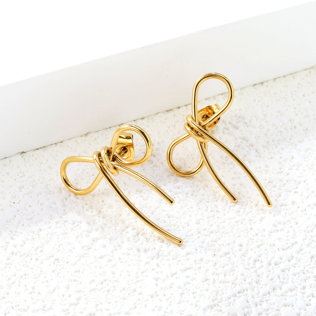 Boucles d'oreilles pour femme avec motif nœud