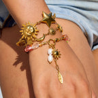 Bracelet pour femme avec pierres colorées et symbole de soleil doré