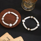 Bracelet de perles pour femme avec motif coquillage classique