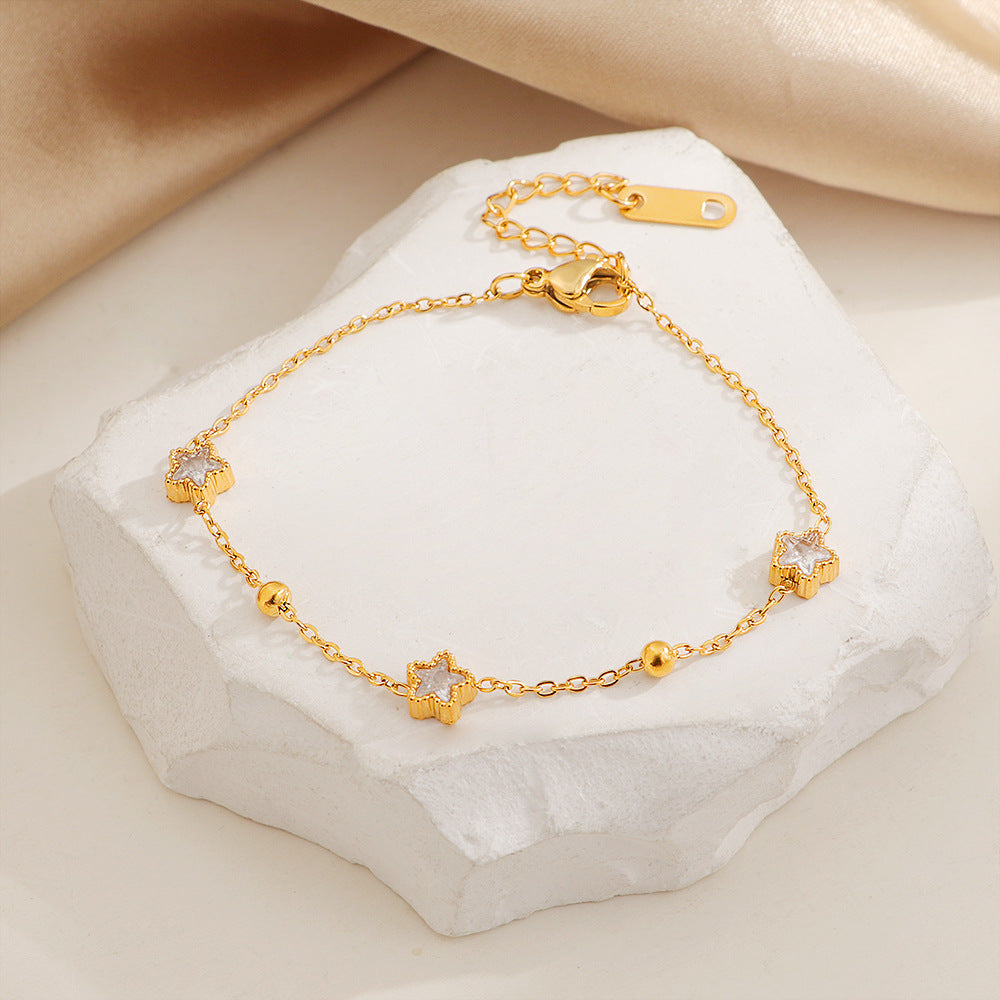 Bracelet de cheville doré pour femme avec étoiles et cristaux