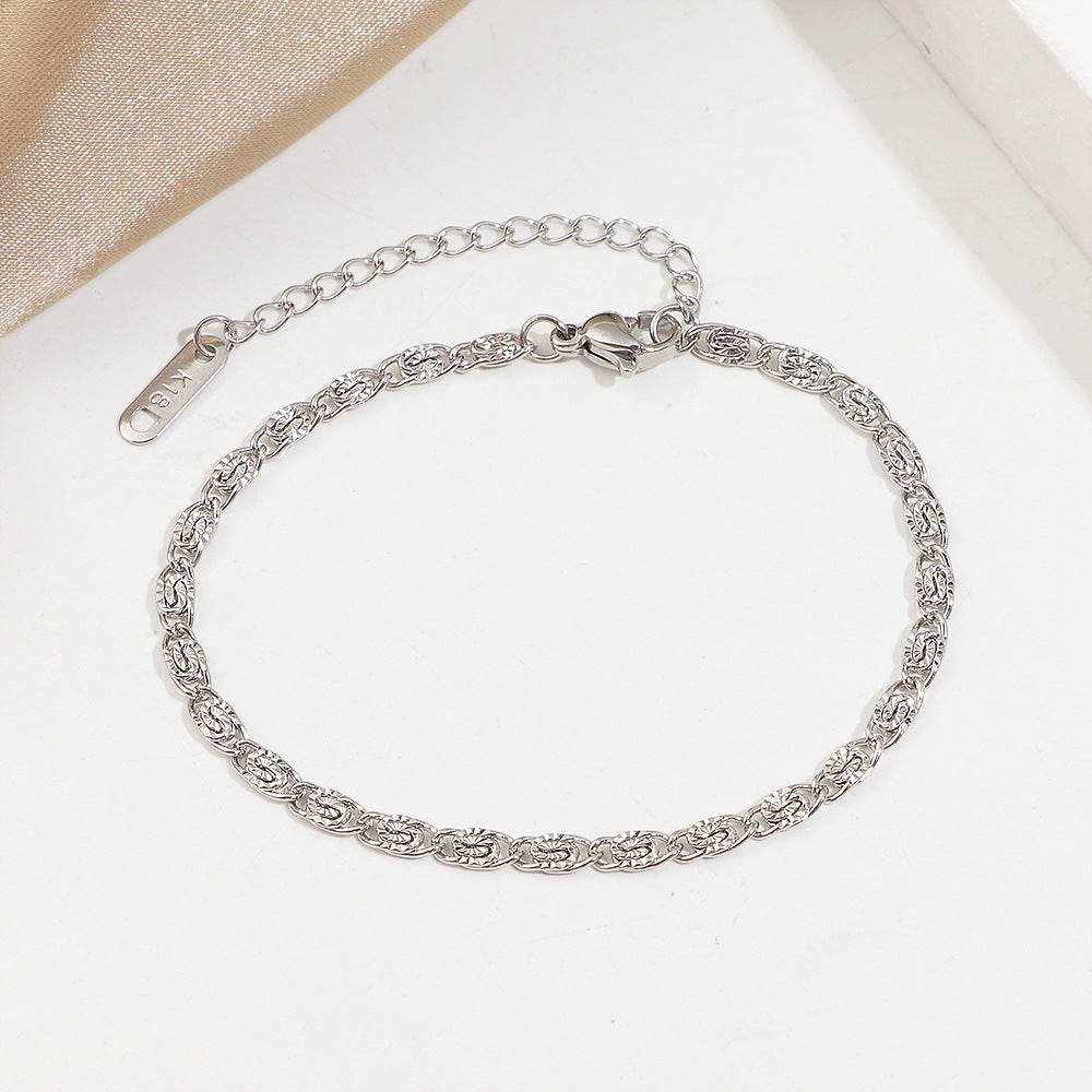 Ensemble collier et bracelet dorés texturés