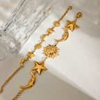 Bracelet pour femme avec pendentifs soleil, lune et étoiles en acier inoxydable