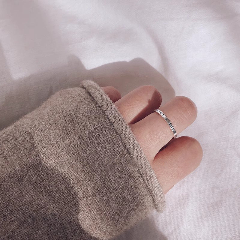 Bague ouverte avec inscription en acier inoxydable