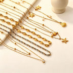 Collier pour femme avec pendentifs coquillages et étoiles