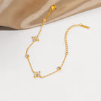 Bracelet délicat à breloques florales pour femme