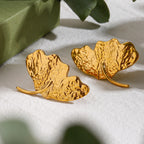 Boucles d'oreilles pendantes pour femme en forme de feuille