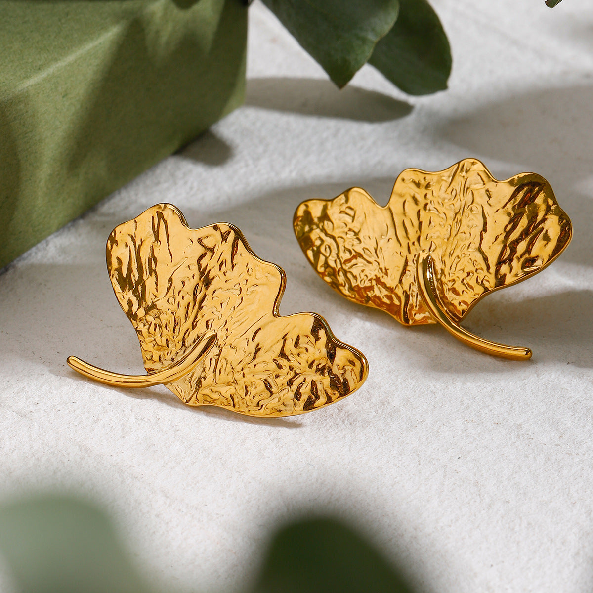 Boucles d'oreilles pendantes pour femme en forme de feuille