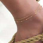 Bracelet de cheville délicat à chaînes superposées