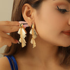 Boucles d'oreilles pendantes pour femme motif feuille