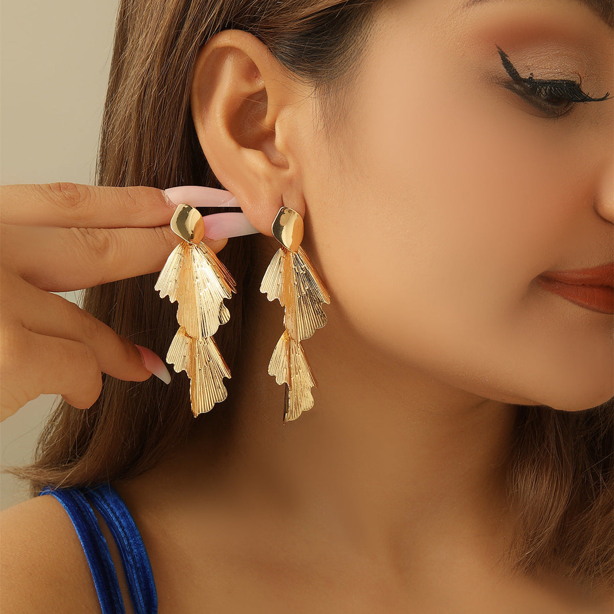 Boucles d'oreilles pendantes pour femme motif feuille