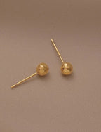 Boucles d'oreilles puces boule géométrique