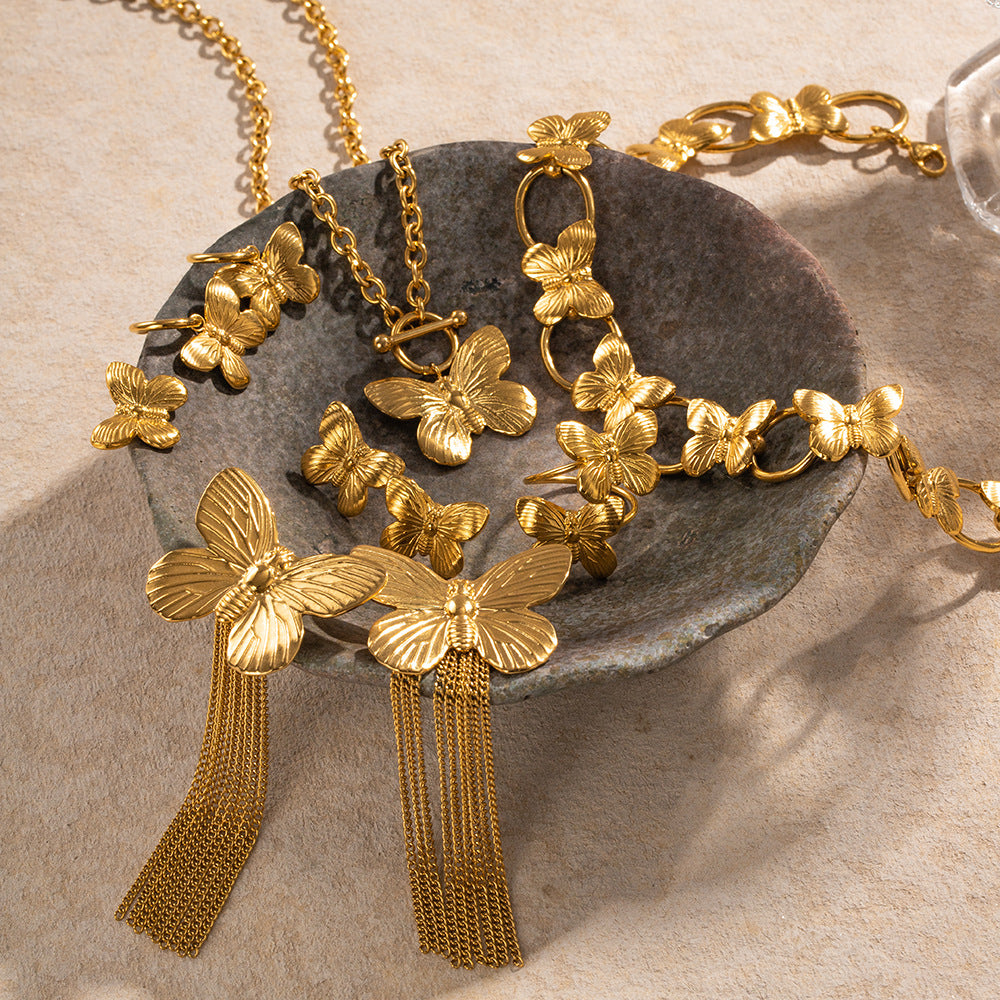Bracelet rigide filigrane pour femme avec motif papillon