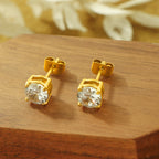 Boucles d'oreilles avec cristaux et monture dorée
