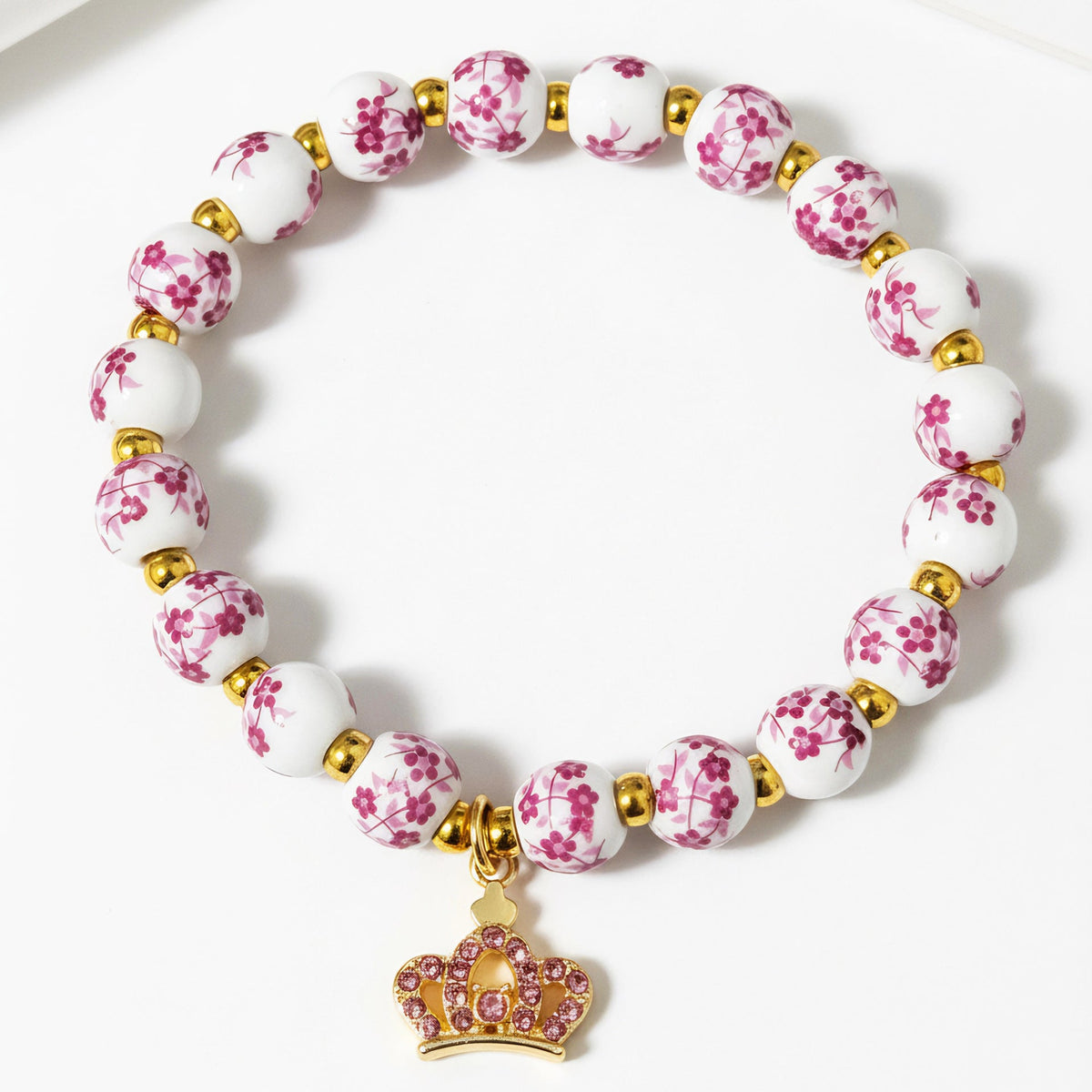 Bracelet pour femme au design floral avec accents dorés