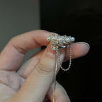 Bague chaîne élégante avec perle et cristal