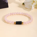 Bracelet pour femme en quartz rose avec accents noirs et dorés