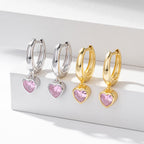 Boucles d'oreilles pendantes cœur avec finition dorée