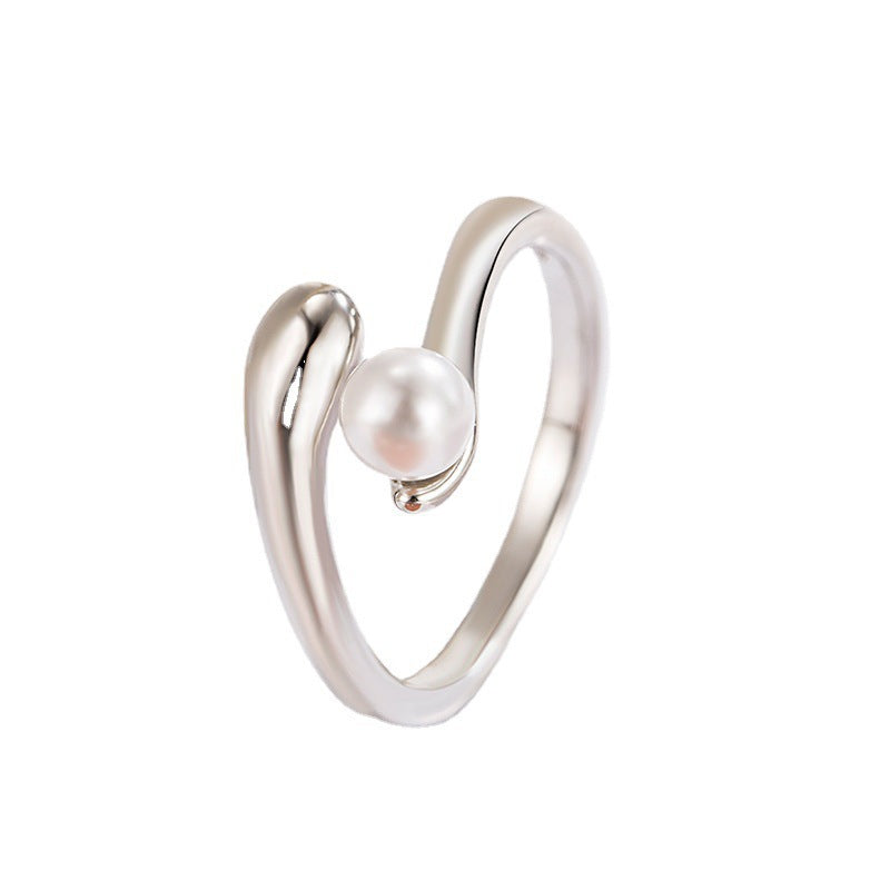 Bague perle élégante pour femme au design moderne