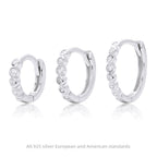 Boucles d'oreilles pendantes avec zircons modernes