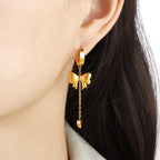 Boucles d'oreilles pendantes papillon et cœur