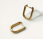 Boucles d'oreilles pendantes pour femme design sculptural