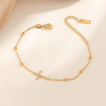 Bracelet pour femme réglable avec breloque croix