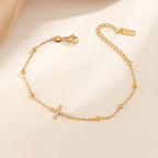 Bracelet pour femme réglable avec breloque croix