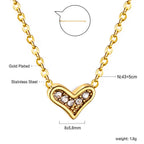 Collier pour femme avec pendentif cœur scintillant en acier plaqué or