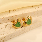 Boucles d'oreilles pour femme au design cœur élégant avec finition dorée