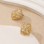 Clous d'oreilles dorés pour femme